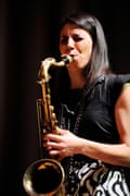 Woman plays saxaphone