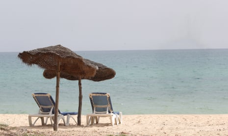 Empty sunbeds on a beach in Hammamet, Tunisia.