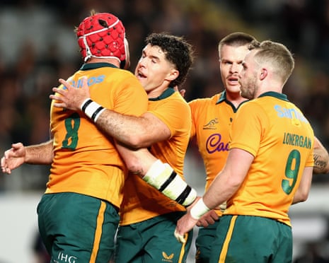 Harry Wilson celebrates scoring a try with Ben Donaldson