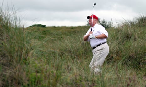 Donald Trump playing a round of golf after the opening of The Trump International Golf Links Course in Balmedie, Scotland.