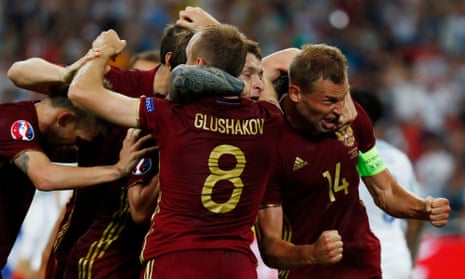 The Russian players celebrate that unlikely equaliser.