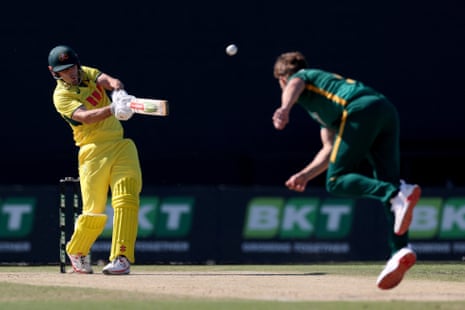 Mitch Marsh hits a six off the bowling of Wiaan Mulder