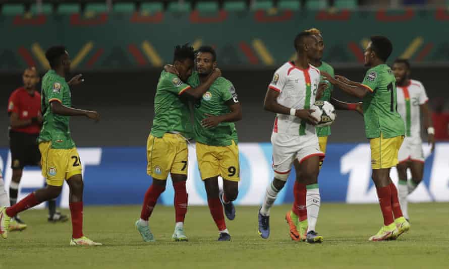 Getaneh Kebede (9) celebrates with his Ethiopia team mates after equalising against Burkina Faso.