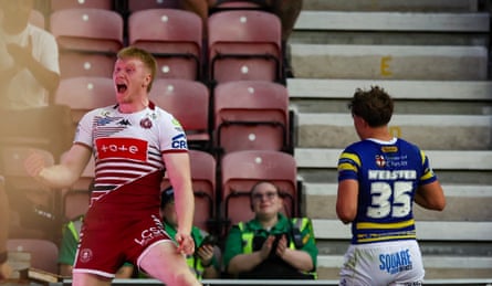 Zach Eckersley jumps for joyousness aft scoring a try