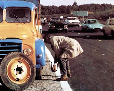 Jacques Tati as Monsieur Hulot in Trafic.