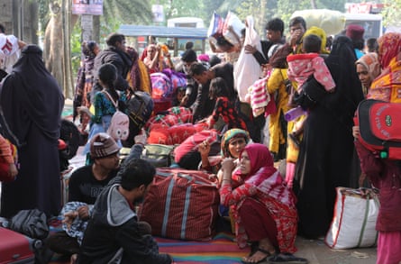 Bangladeshi nationals gather at the Hakimpur border in West Bengal.