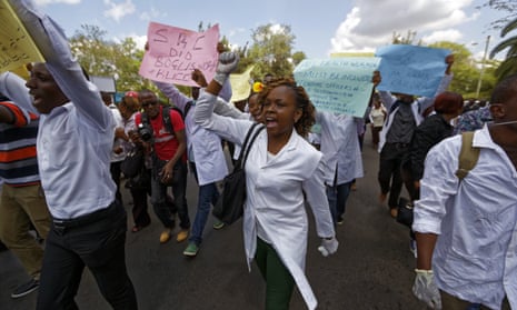 Striking Kenyan medics demonstrate over low pay at Uhuru Park in central Nairobi, on Monday.