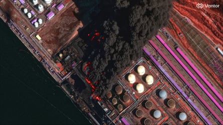A satellite image shows smoke rising from Russia’s Baltic port of Ust-Luga after a Ukrainian attack