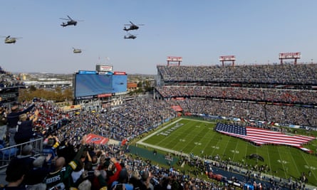 Helicopters fly over Nashville’s Nissan Stadium during the Salute to Service pre-game activities