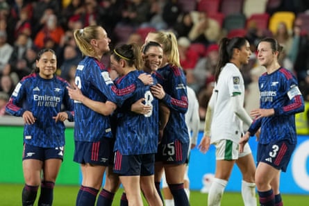 Mariona Caldentey (No 8) with her teammates after scoring Arsenal’s third