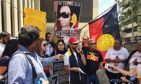 The family of Ms Dhu hold a rally with supporters outside a coronial inquest in Perth, Australia, on 2 December 2015, to call for justice for the 22-year-old Aboriginal woman who died in custody in 2014.