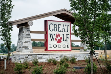 A stone entrance monument displays the Great Wolf Lodge sign in LaGrange, Georgia