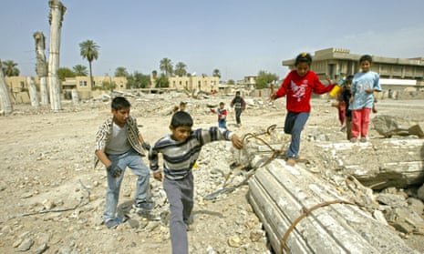 Children play in the ruins of the Iraqi Air Force Club, Baghdad, three years after the 2003 US-led invasion.