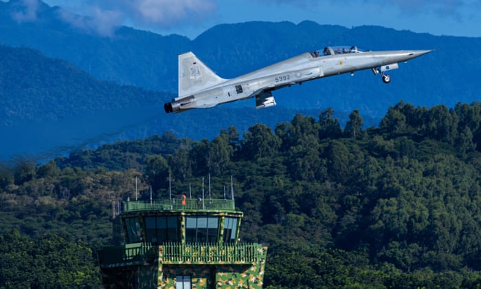 A Taiwanese F-5 fighter jet is seen after taking off from Chihhang Air Base on 6 August in Taitung, Taiwan.