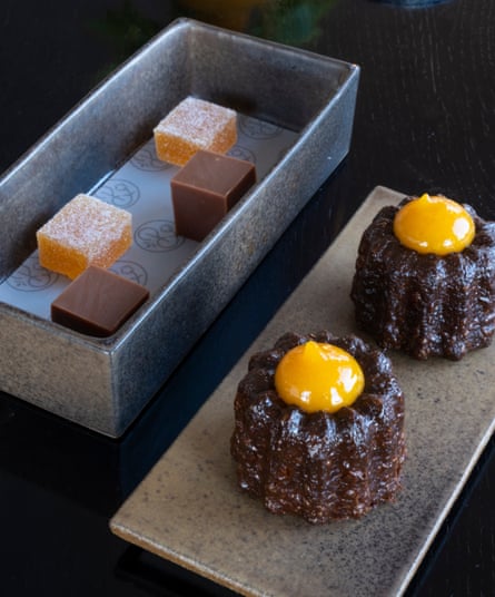 Less promises, delivers more: Pentonbridge Inn's orange fruitcake, dark chocolate fudge, and canele de bordeux with apricot puree.