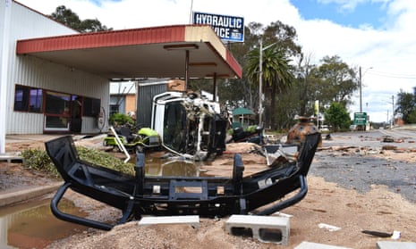 Smashed vehicles and debris in Eugowra.