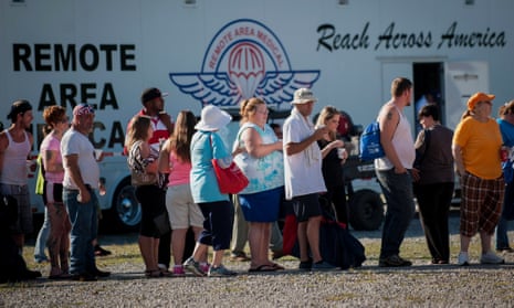 People queue up to access free medical care during the annual remote area medical clinic in Wise, Virginia