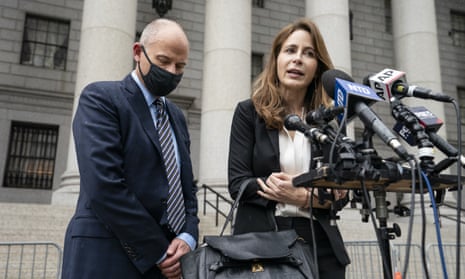 Michael Avenatti, left, stands with his lawyer Danya Perry during a news conference after he departs a sentencing hearing at Manhattan federal court on Thursday.