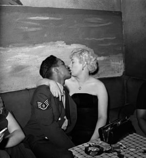 Couple kissing at the Sunset Club, Carnaby Street, London, December 1951. Henderson “And Soho was the place in those days, particularly the Sunset Club in Carnaby Street, where jazz played till seven in the morning. That was where the musicians went when the other clubs closed: West Indians and Africans along with the Chris Barbers and the Humphrey Lyttletons. Racially, it was totally mixed. There was no such thing as a black clientele then.”