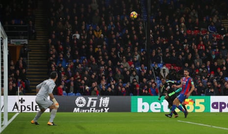 Jermaine Defoe volleys the ball over Speroni.