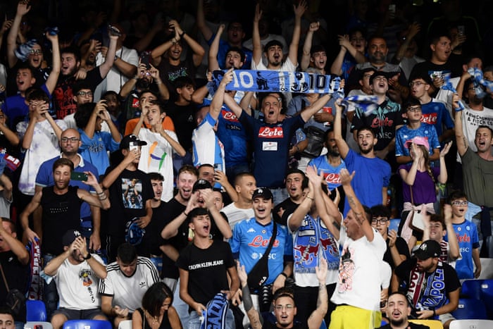 Napoli supporters cheer prior to the Champions League Group A first leg football match between Napoli and Liverpool.