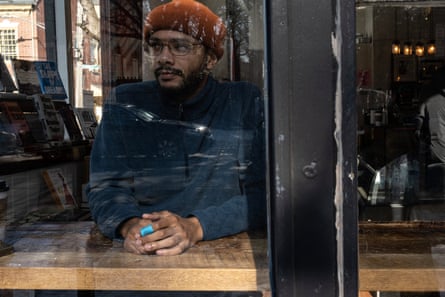 a man sits in a cafe