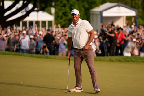 Brooks Koepka on the green after winning the PGA Championship.