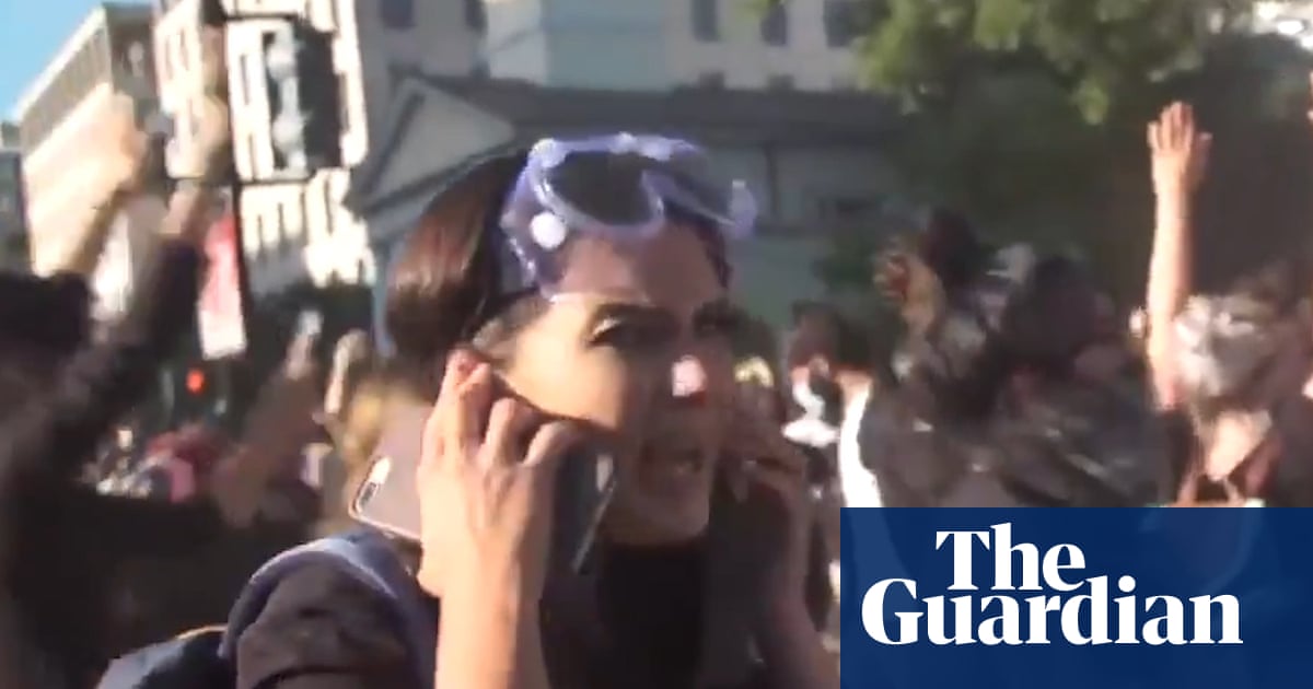 Journalists charged at by police while live on air during Washington protests – video