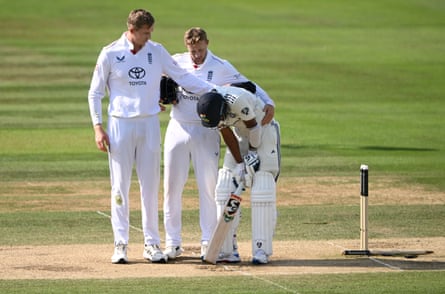 Siraj is consoled by Zak Crawley and Joe Root