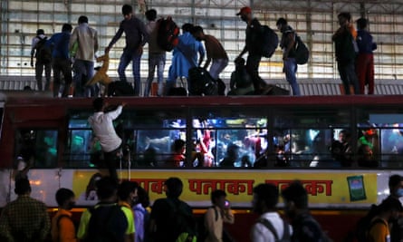Migrant workers outside Delhi in April attempt to return to their villages following a government-ordered lockdown.