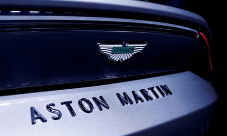 The Aston Martin logo on a car
