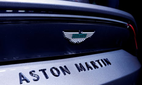 The Aston Martin logo on a Vantage car