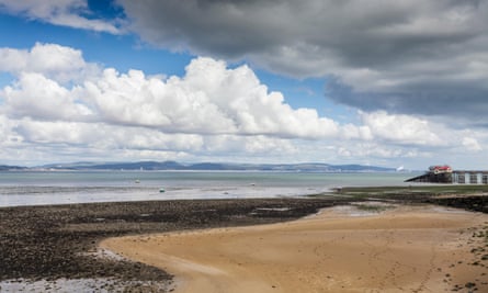 sandy bay and pier