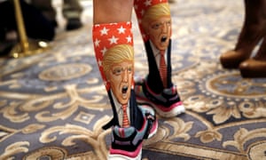 An 11-Year-old girl wears Trump socks at a campaign event for the Republican nominee at the Trump International Hotel in Washington, D.C.