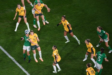 Ireland's midfielder #17 Sinead Farrelly (L) fights for the ball with Australia's defender #15 Clare Hunt