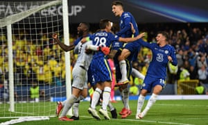 Chelsea players celebrate after winning the penalty shoot-out.