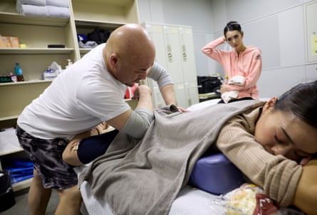 Dancers receive treatment inside the physio rooom, backstage.
