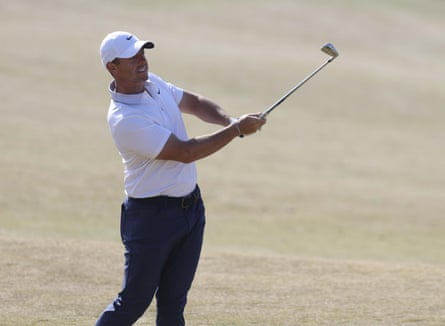 Rory McIlroy plays a changeable astatine Royal Portrush