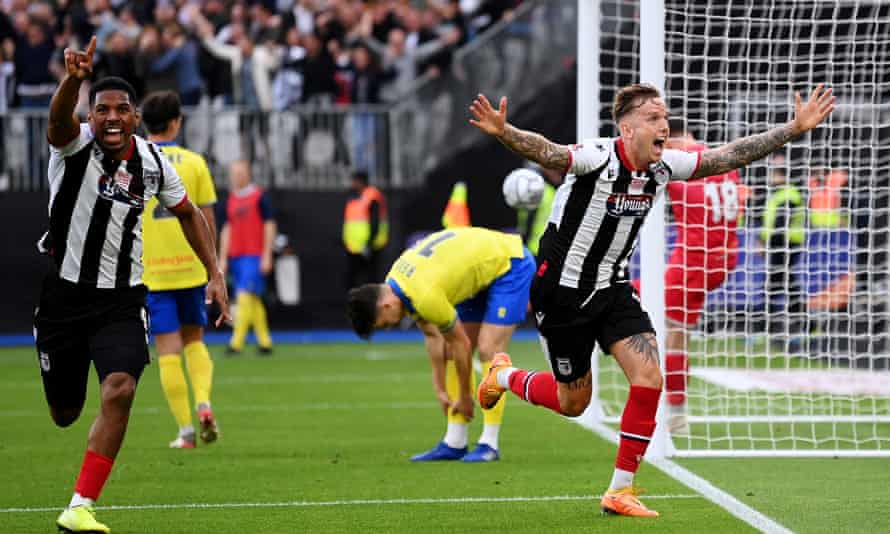 Grimsby fight back to seal EFL return with extra-time win over Solihull Moors | Vanarama National League 1 Jordan Maguire-Drew (front, right) celebrates after firing Grimsby ahead in extra time.
