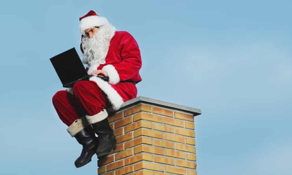 Santa up a Chimney on a laptop