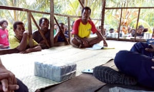 Residents of Budi Budi with part of the cocaine haul