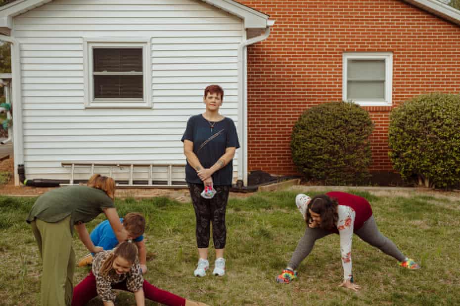 Mary Beth Cochran is surrounded by her grandchildren in Canton, North Carolina.