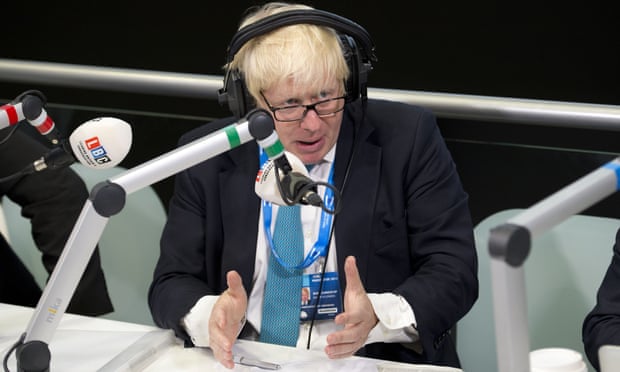 Boris Johnson takes part in a radio phone-in during the Conservative party conference.
