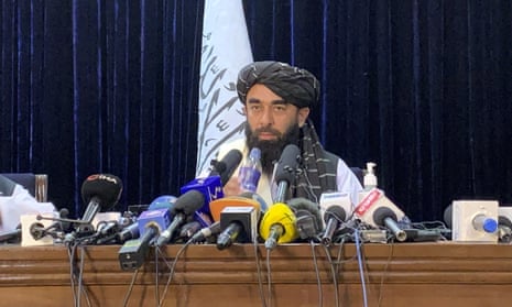 Taliban spokesman Zabihullah Mujahid speaks at at his first news conference in Kabul.