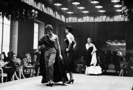 Models parade in evening wear at a fashion show in Florence, Italy, 1951.
