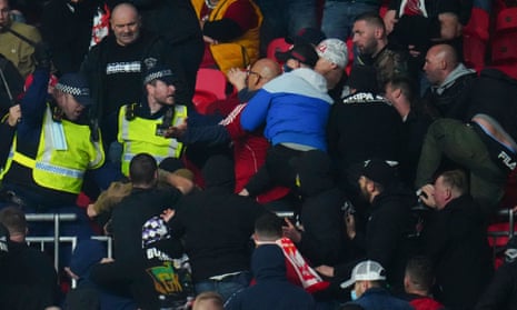 Hungary fans clash with police at Wembley.