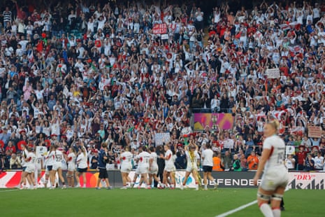Red Roses fans cheer the England team as they conduct a lap of honour after winning the Women’s Rugby World Cup 2025 final.