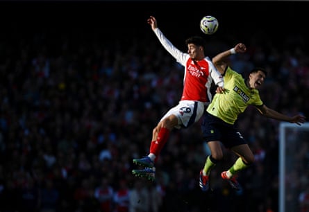 Arsenal’s Kai Havertz in aeriel action with Southampton’s Jan Bednarek at the Emirates Stadium