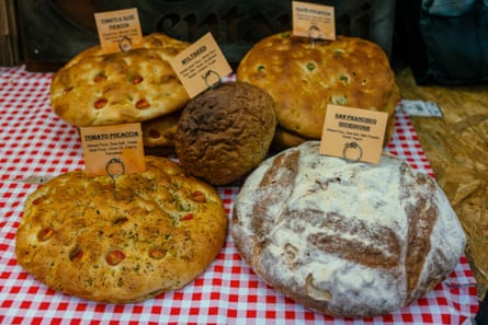 Bread at a baker’s stall on Broadway Market in the Hackney district of London, UK