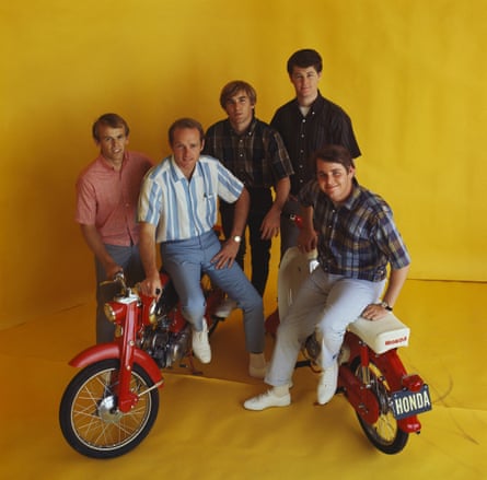 a group of people on motor bikes